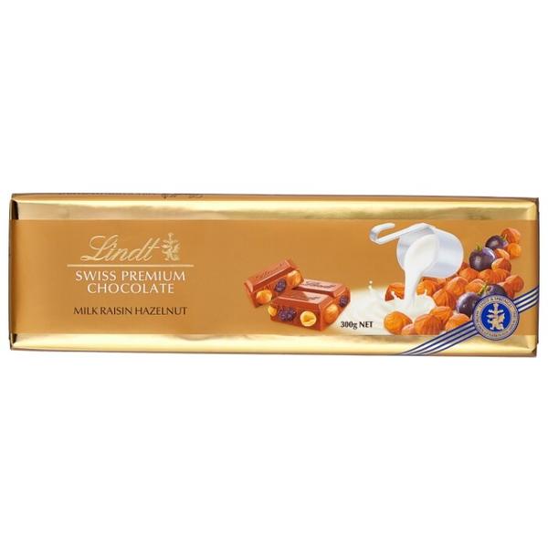 Шоколад Lindt Swiss premium молочный с фундуком и изюмом
