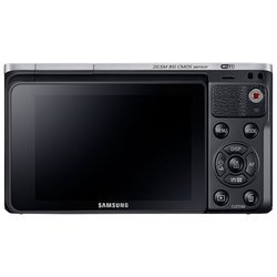 Samsung NX Mini (silver/black 20.5Mpix 9mm 3" 1080p SDHC BSI-CMOS turLCD HDMI WiFi Набор с объективом)