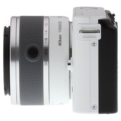 Nikon J1 Kit (white 10,1Mpix 10-30mm / 30-110mm 3 1080 SDHC Li-Ion, Ком-т с объективами)